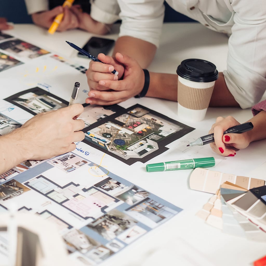 Image of a team reviewing Airoom® build plans