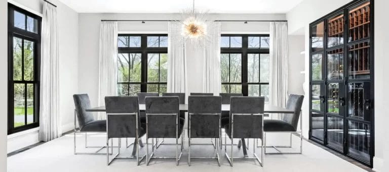 Dining Room with Sleek Chairs and Large Windows