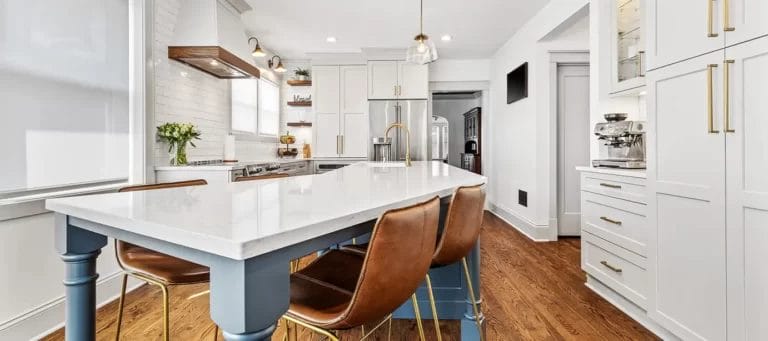 Kitchen With Island and Leather Chairs
