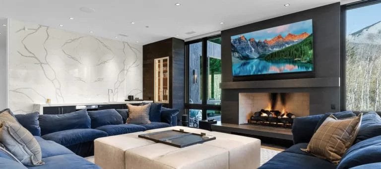 Living Room With Blue Sofas and Fireplace