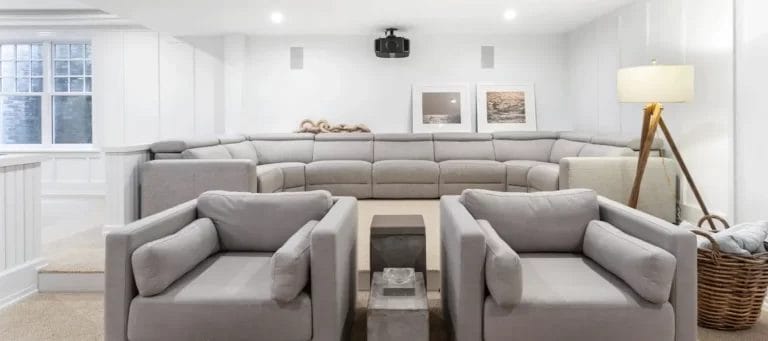 Living Room With Grey Sofas and Projector
