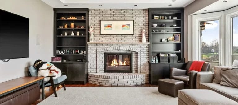 Living Room with Fireplace and Shelving Units