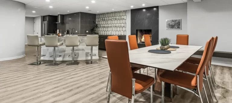 Modern Dining Area with Chairs and Kitchen