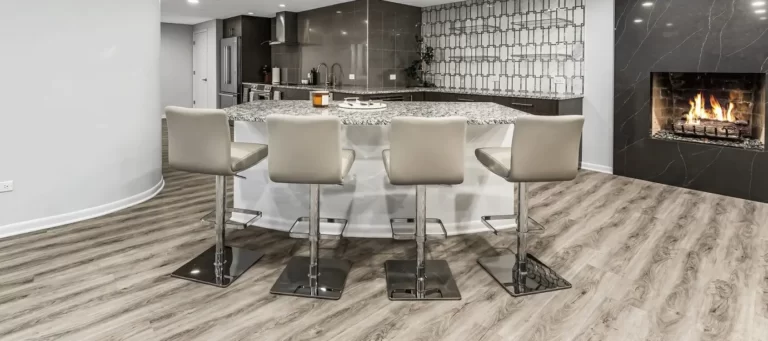 Kitchen with Bar Stools and Fireplace