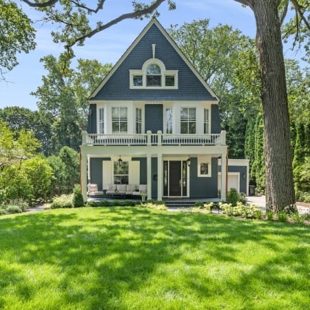 Charming Victorian with Blue Siding and White Trim Throughout