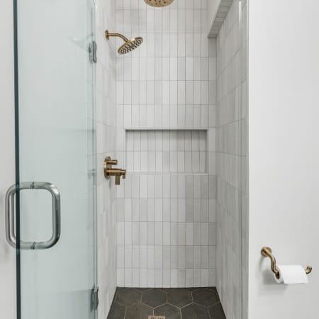 Gold Finish Rain Shower with Vertical Porcelain Tile