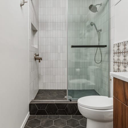 Half Bathroom with Hexagon Tile Flooring