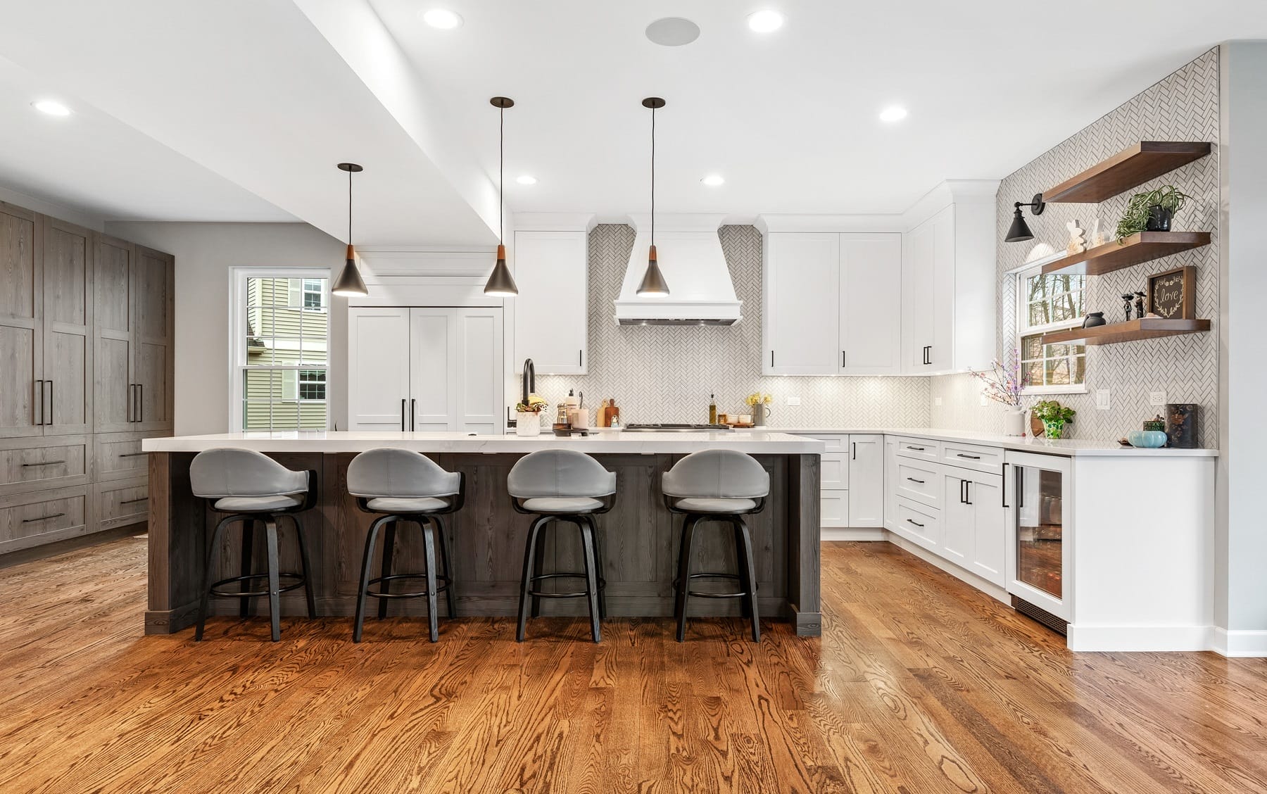 Transitional Entertaining Kitchen with Integrated Island Seating