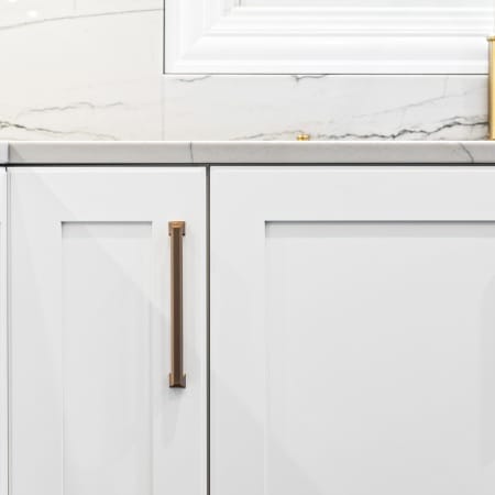 White Shaker with Gold Handle