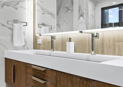 Two Faucets with an Extra Long Single Sink Basin