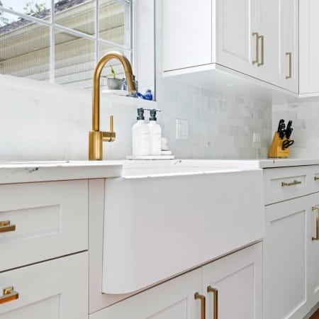 Farmhouse Apron Sink with Gold Faucet and Handles