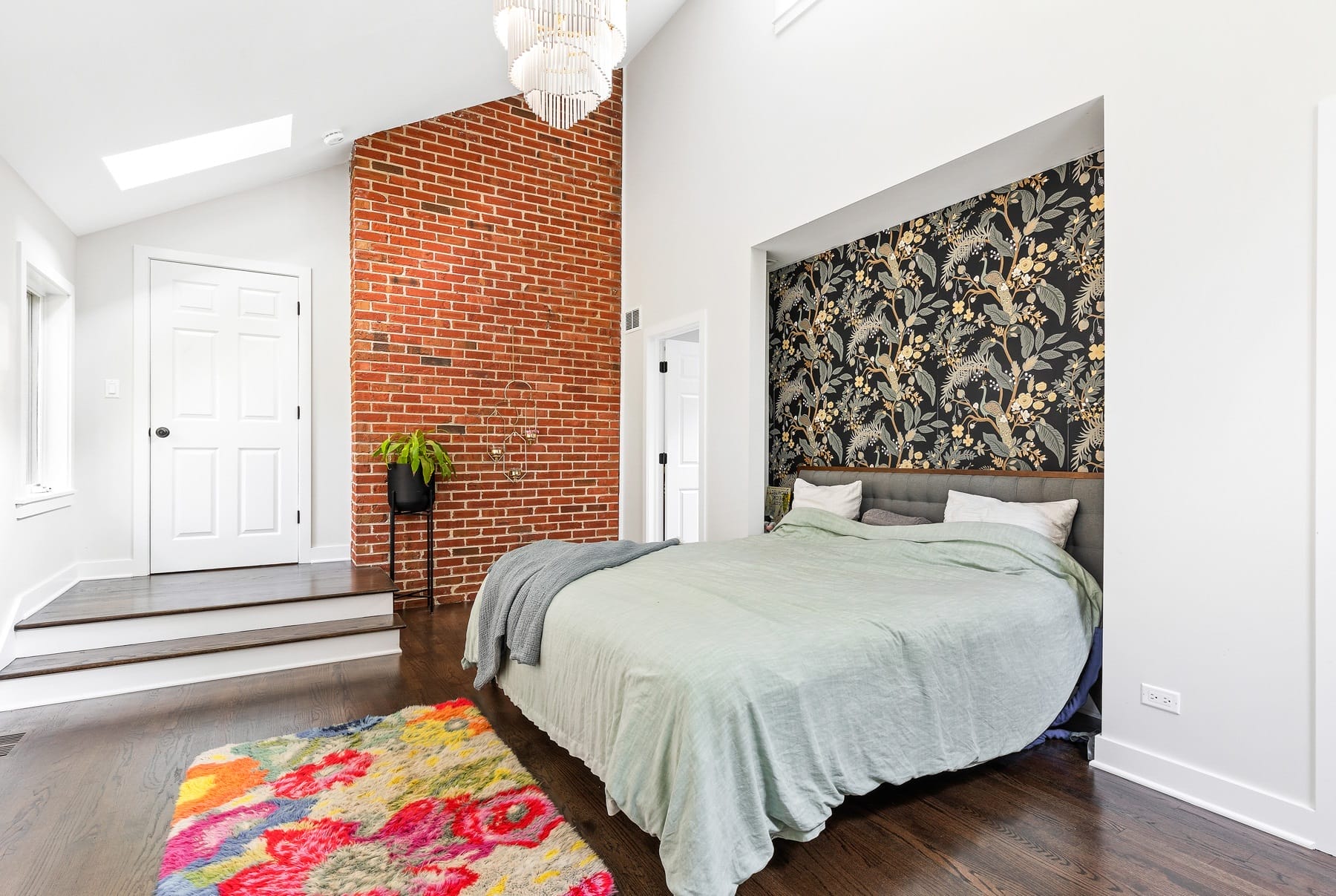 Bedroom with Custom Cut-Out and Exposed Brick