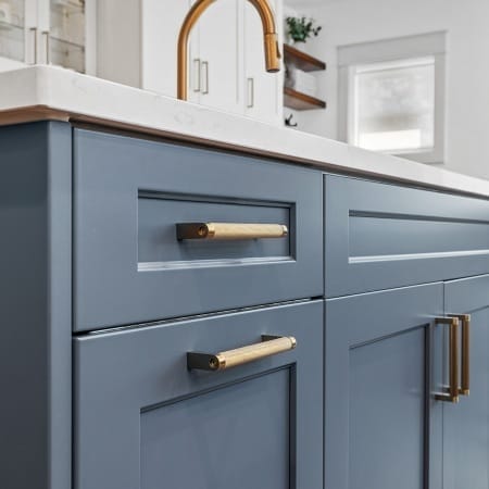 Blue Shaker Cabinet with Copper Pulls