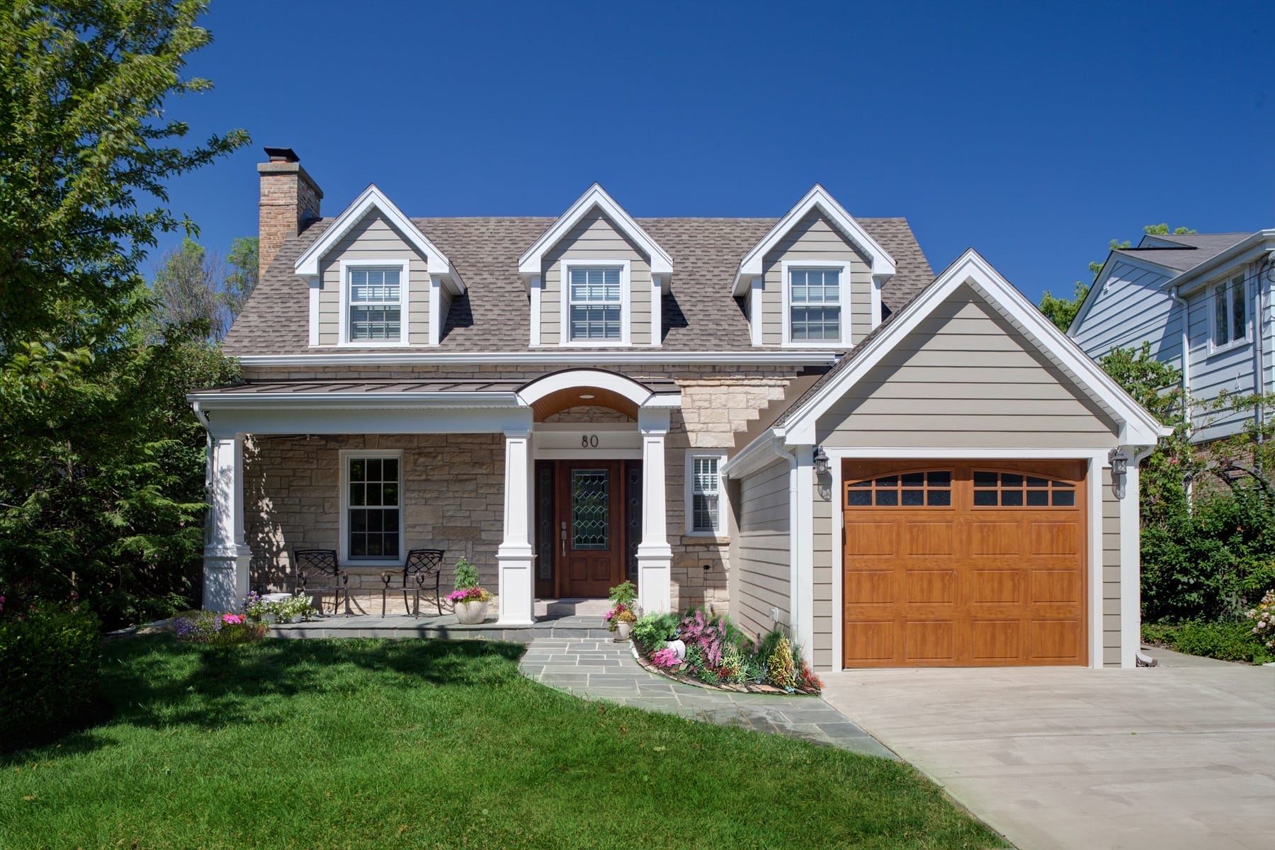Gabled End Overhang with Boxed in Soffit, Coachman Style Garage Door