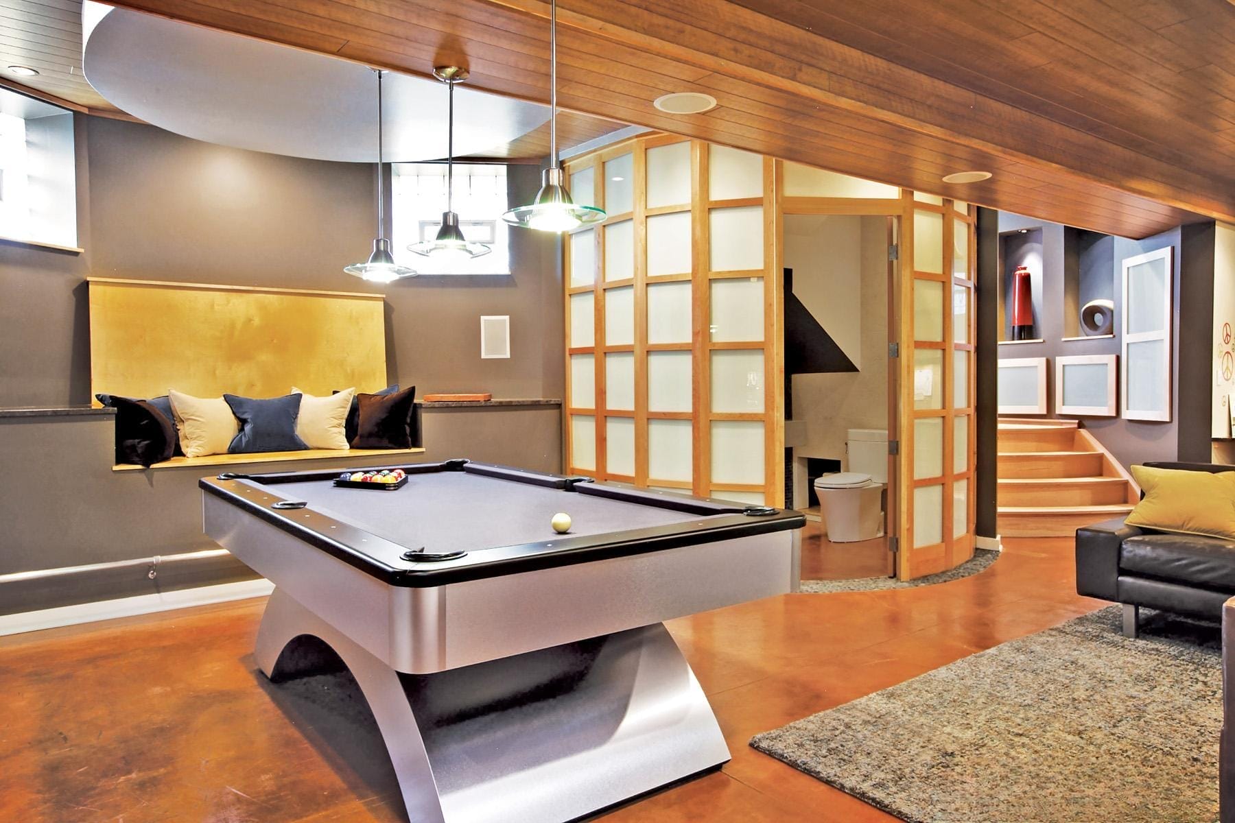 Wood Paneled Ceiling and Rounded Powder Room